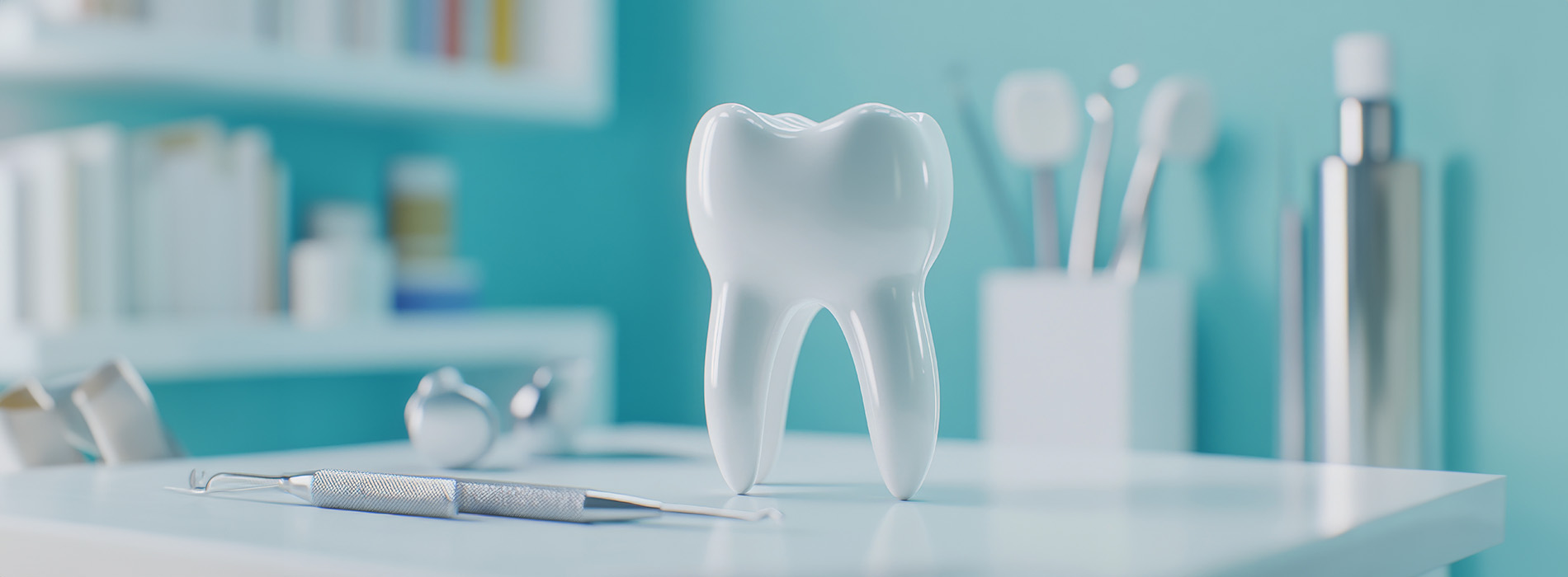 A 3D model of a tooth placed on a bathroom counter with dental tools and products behind it.